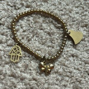 Women’s vintage‎ gold tone stainless steel charm bracelet one size stretches